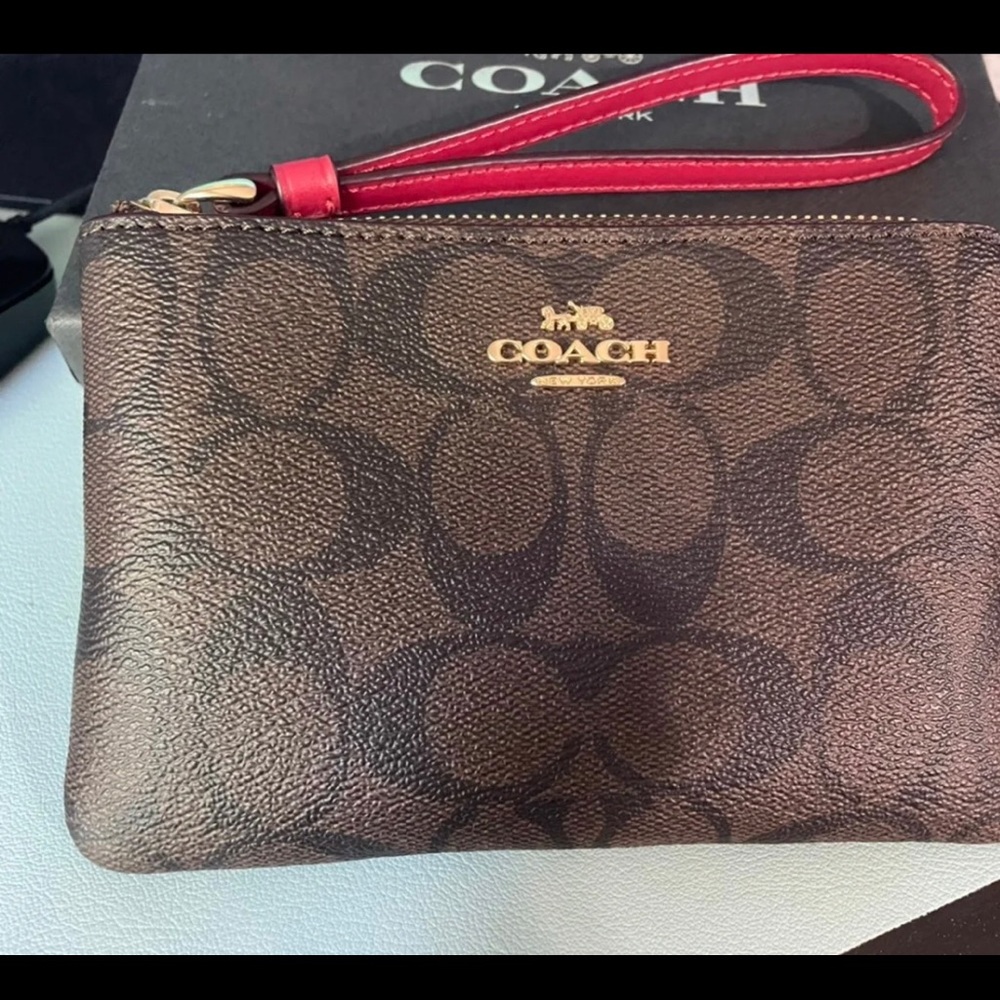 Authentic Coach brown signature wristlet